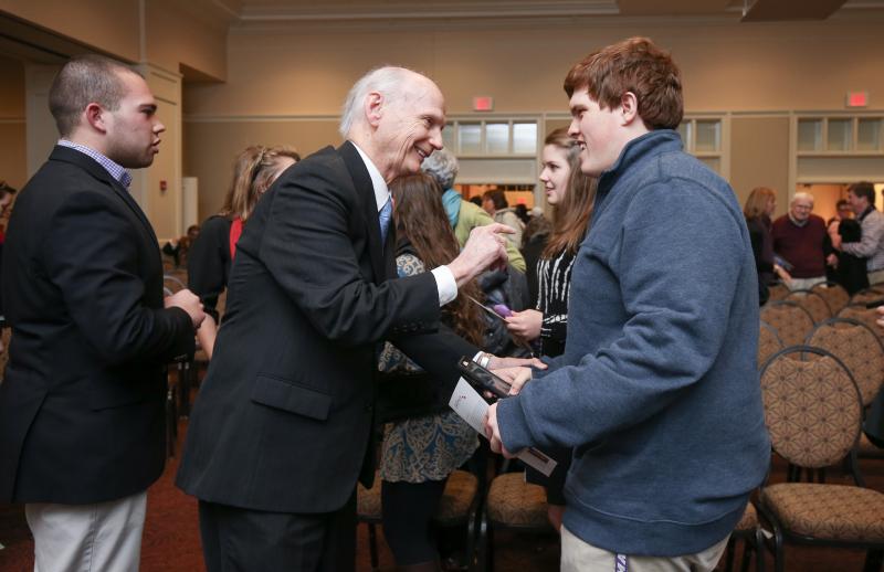 Secretary Riley with SCU student Craig Yount