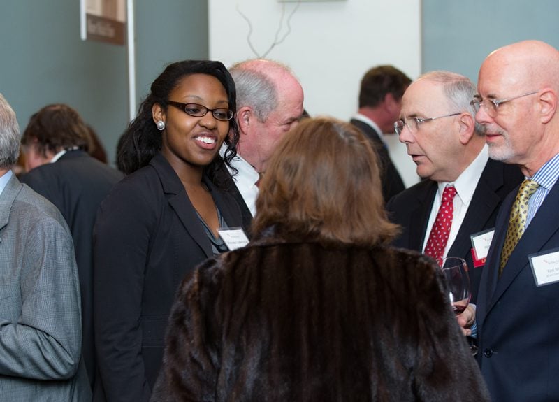 Senator Wes Hayes and Ken May speaking with guests