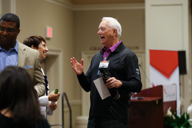Tobi Kinsell speaking with a guest