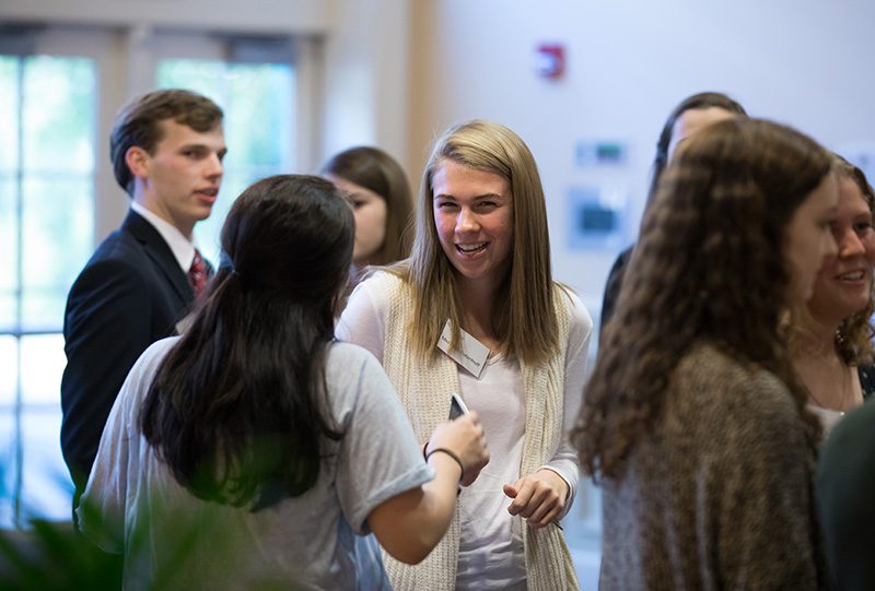 Hollingsworth and Townes students gathering before dinner with Nick Galasso