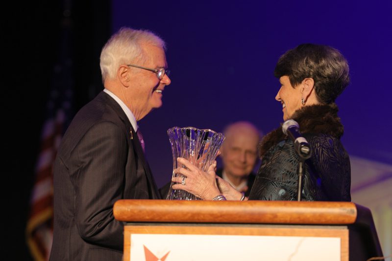 Paula Harper Bethea presenting the award to Hayne Hipp