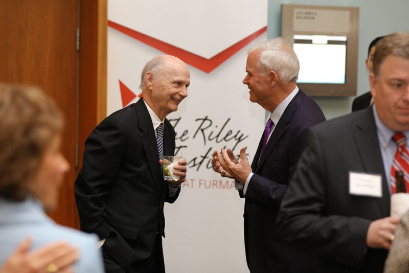 Secretary Riley speaking with Hayne Hipp, who will be awarded the 2016 Wilkins Award for Excellence in Civic Leadership