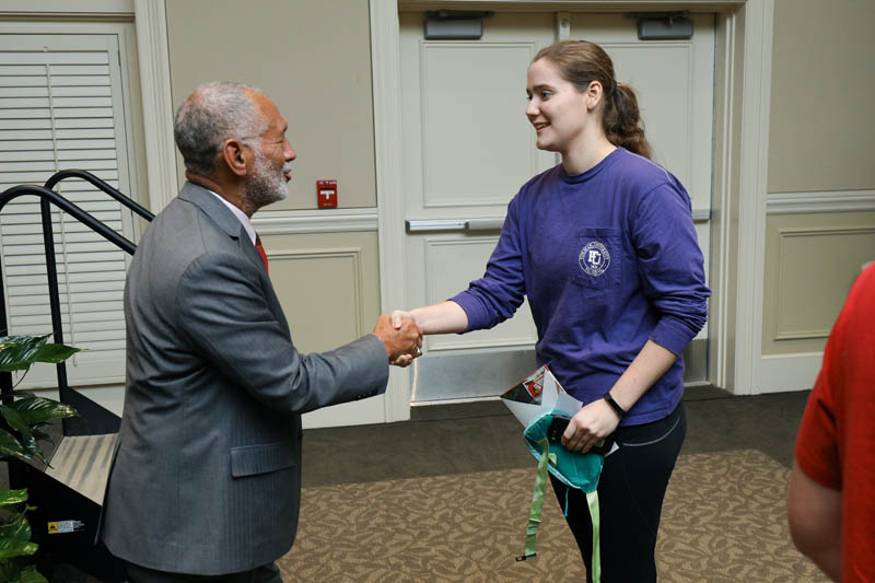 A student with Charles Bolden