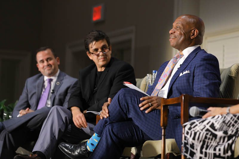 (l-r) Neal Collins, Akan Malici and Garry McFadden speaking