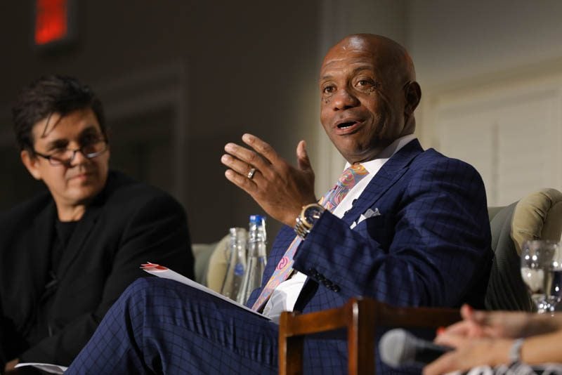 (l-r) Akan Malici and Garry McFadden speaking