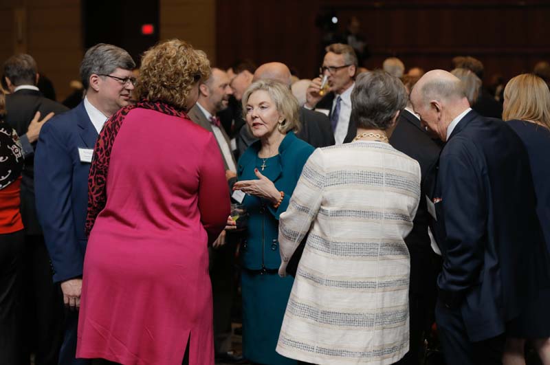 Elizabeth and Charles Davis speaking with Susan Wilkins