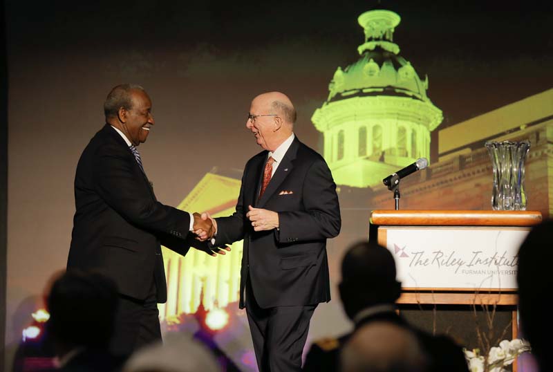 David Wilkins welcoming Senator John Matthews to the stage