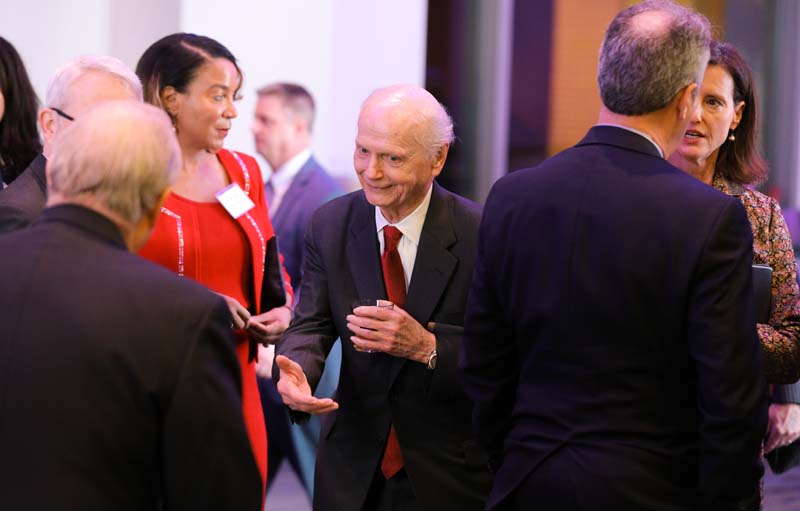 Secretary Riley mingling with guests
