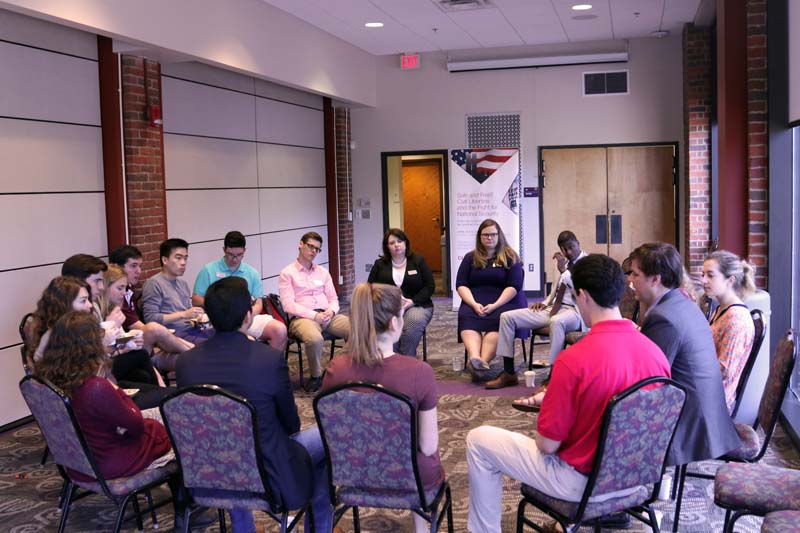 Alumni meet with students over coffee to discuss their personal journeys