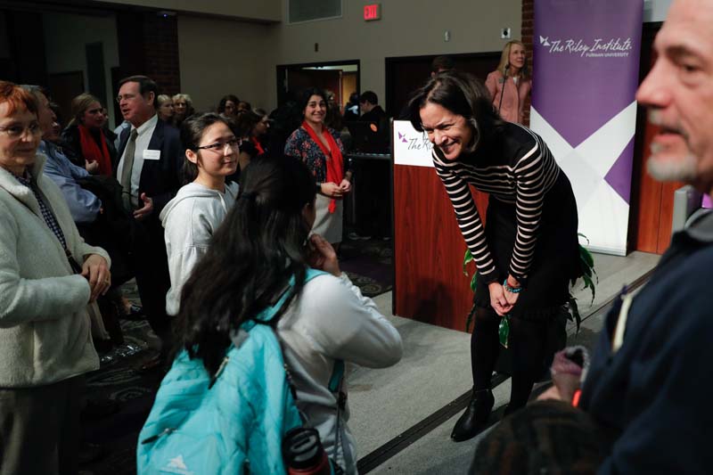 Angela Maria Kelley continuing the conversation with students