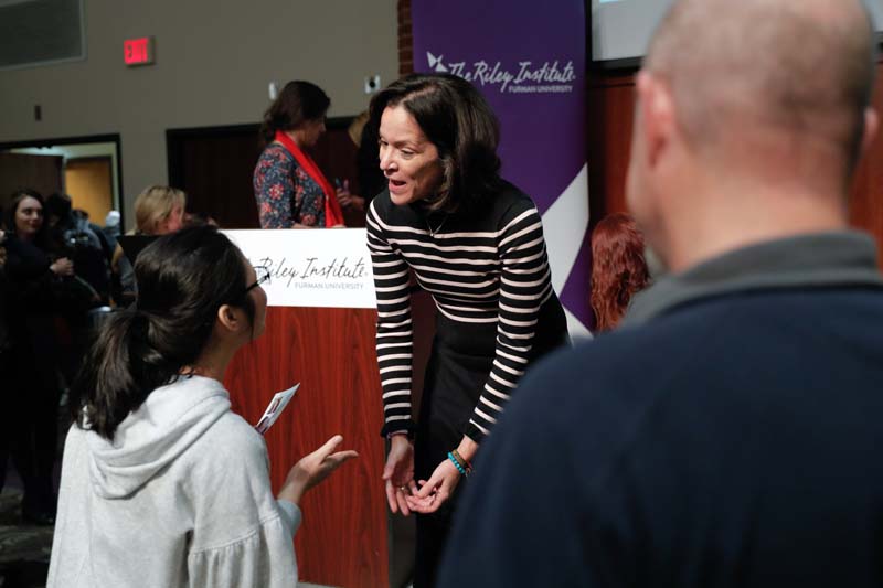 Angela Maria Kelley continuing the conversation with students