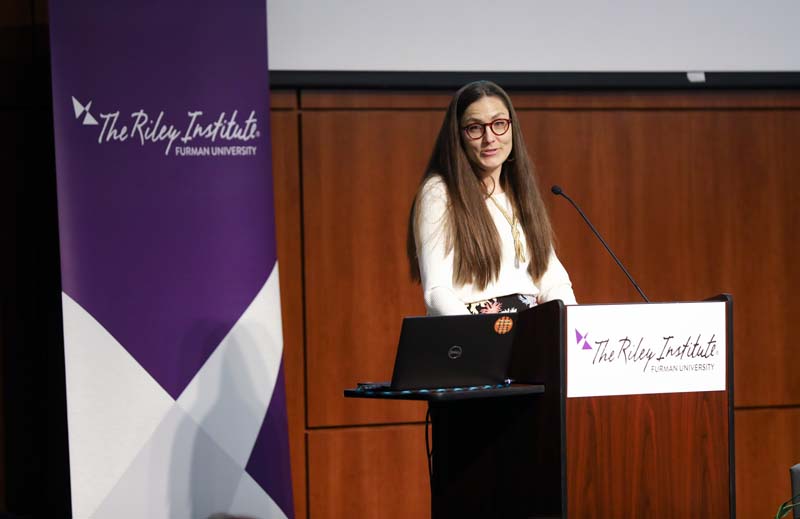 Brittany Arsiniega introducing tonight's speaker, Angela Maria Kelley