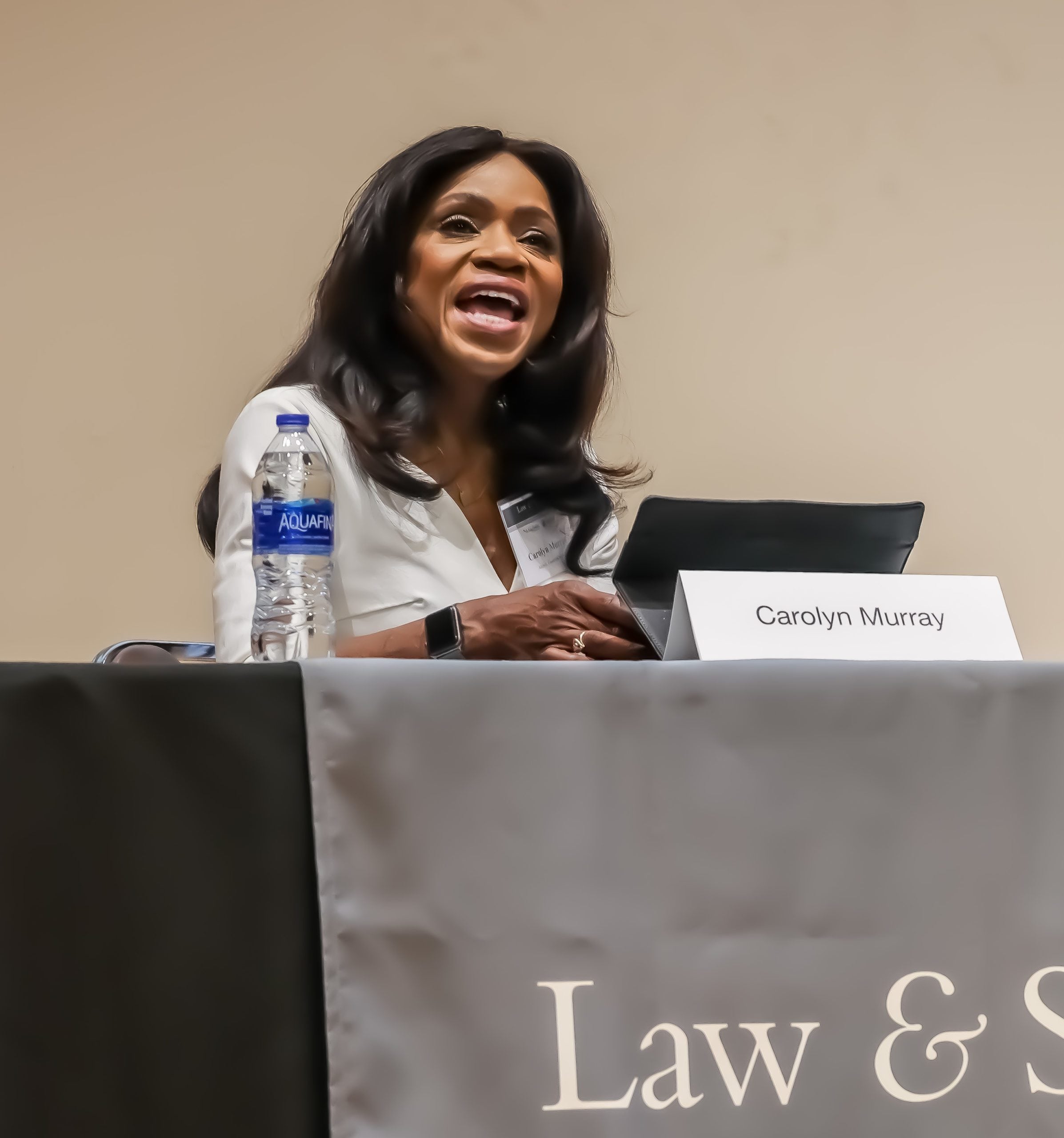 Emmy award-winning anchor Carolyn Murray moderates a panel about local advocacy initiatives. 