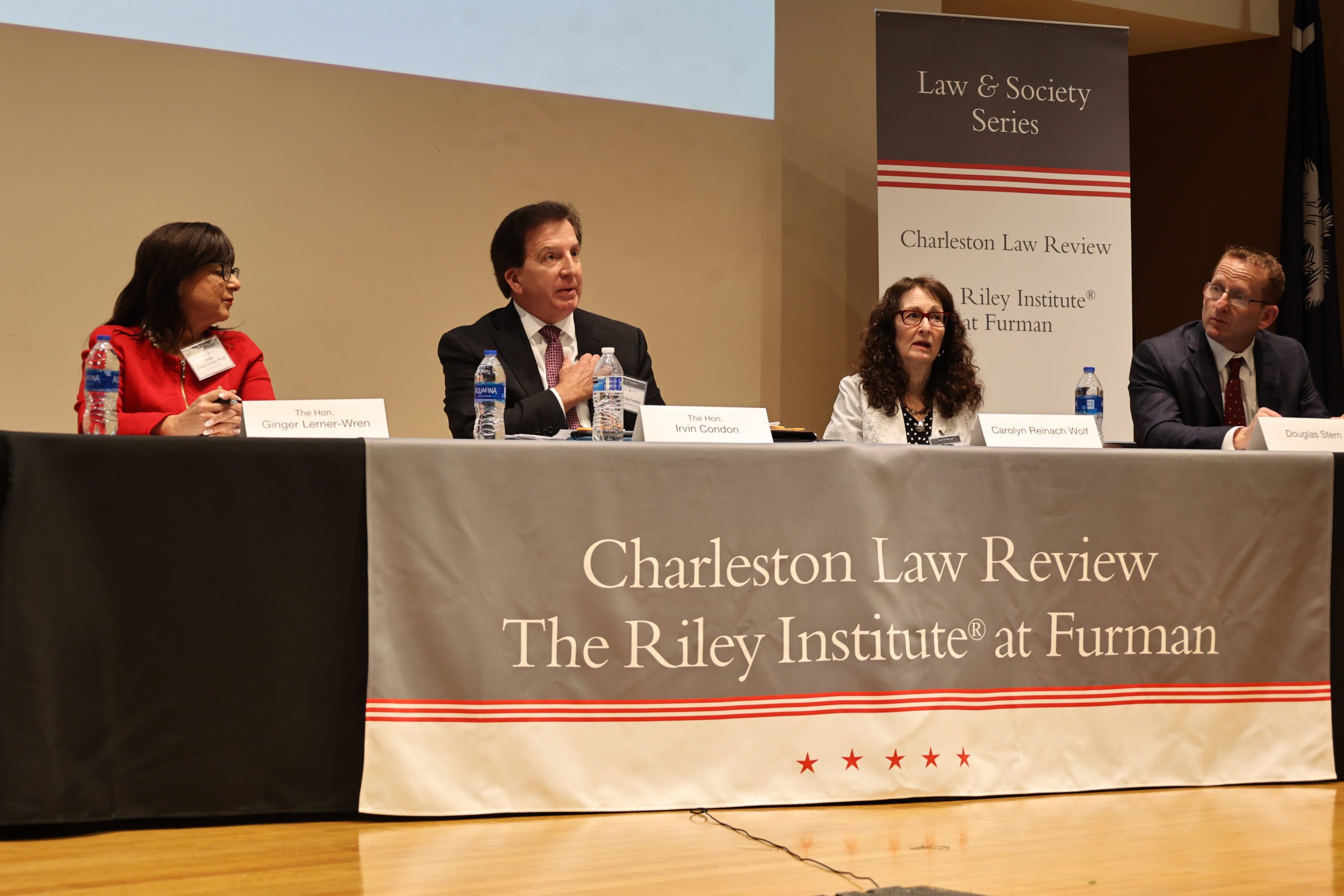 The Honorable Judge Ginger Lerner-Wren, The Honorable Judge Irvin Condon, Carolyn Reinach Wolf, Esq., and Douglas Stern, Esq. speak on a panel about the intersection of mental health and the law. 