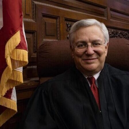 Judge Richard Gergel in robes in a courtroom