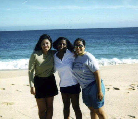 (l-r) APEC student, Ayesha Ahmad, and Shunta Harmon on the beach