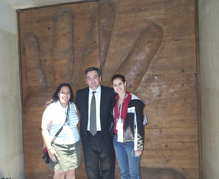 (l-r) Cindy Youssef and Monica Handa with a Congressman in the center