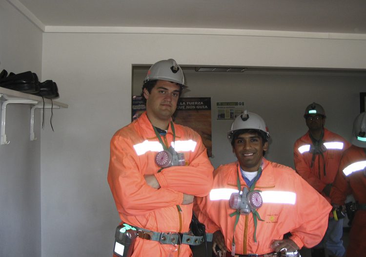 Dan Ennis and Amer Ahmad dresed in mining garb