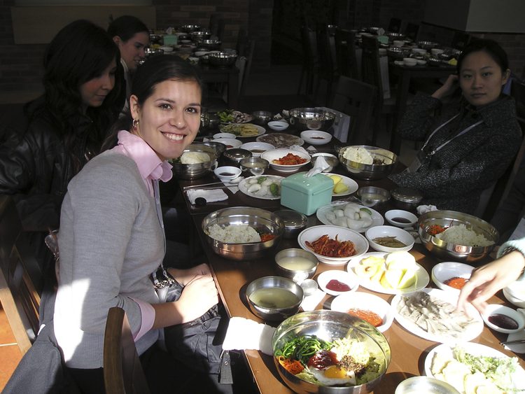 Monica eating a traditional Korean meal