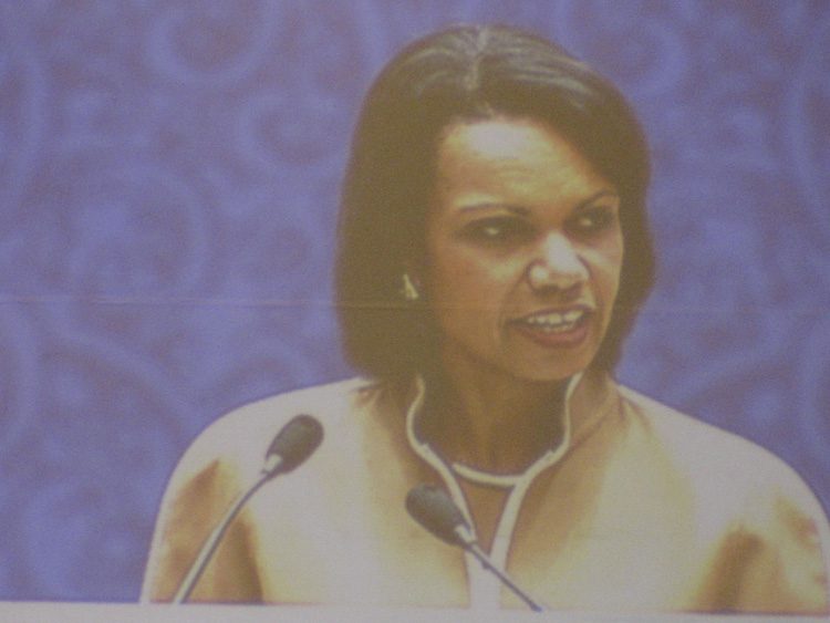 Secretary of State Rice speaking at the CEO Summit-speakers were projected on a large screen