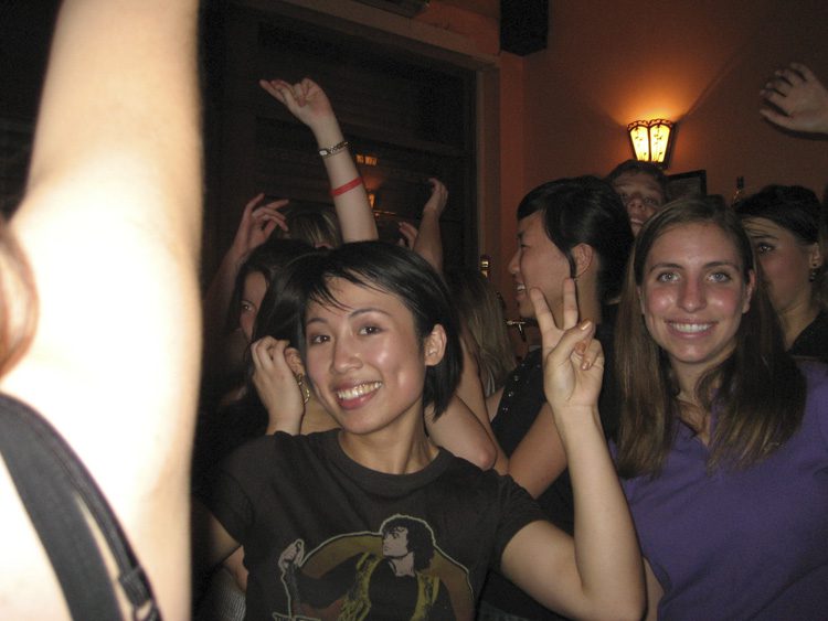 The students (Kristen Capogrossi far right) from the twenty-one member economies socializing at a French cafè