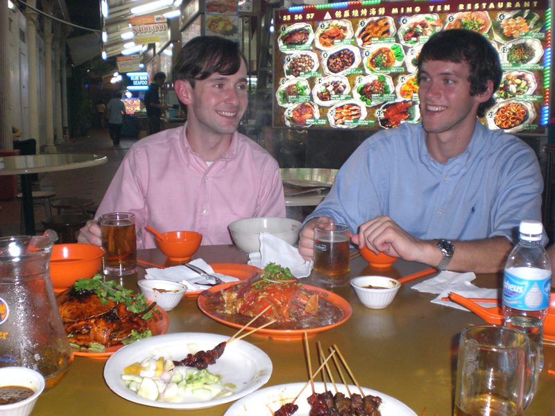 (l-r) David Coe, Furman alum and Carey. Don Gordon and the students met several Furman alums while in Singapore