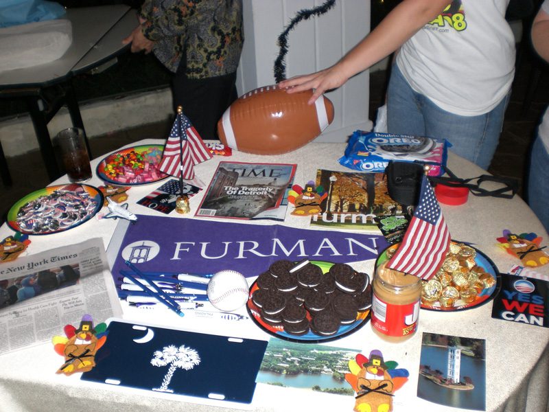 On cultural night, the students present items that represent their country; this was Furman's table.