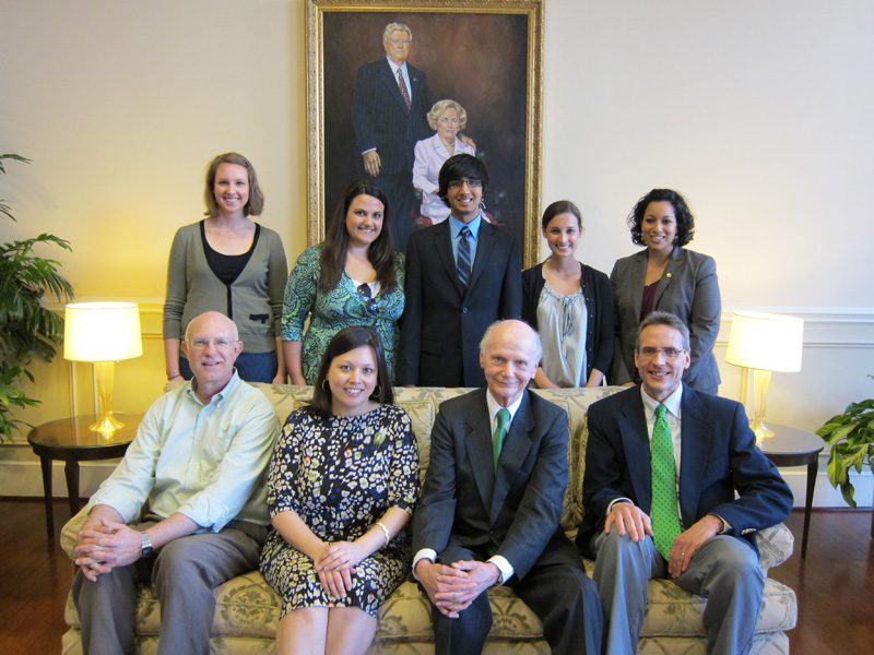 APEC students and professors met with Secretary Riley. Row 1 (l-r) Dr. Cleve Fraser, Dr. Jessica Hennessy, Secretary Riley, Dr. Ken Petersen; Row 2 (l-r) Marissa Pavia, Elizabeth Trenary, Karim Kajani, Nora Collins, Cindy Youssef