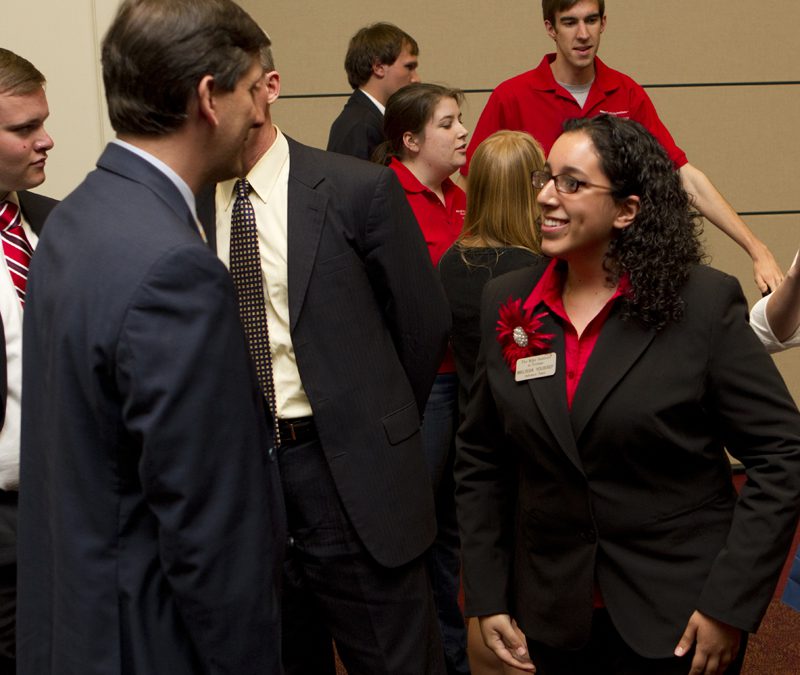 Melissa Youssef conversing with Senator Vincent Sheheen