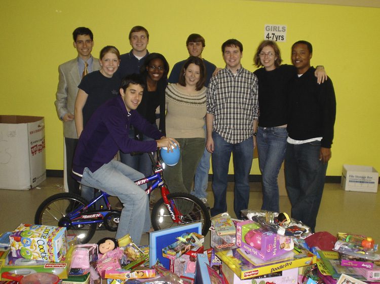 The Advance Team volunteering to separate toys for Hands on Greenville Christmas 2006