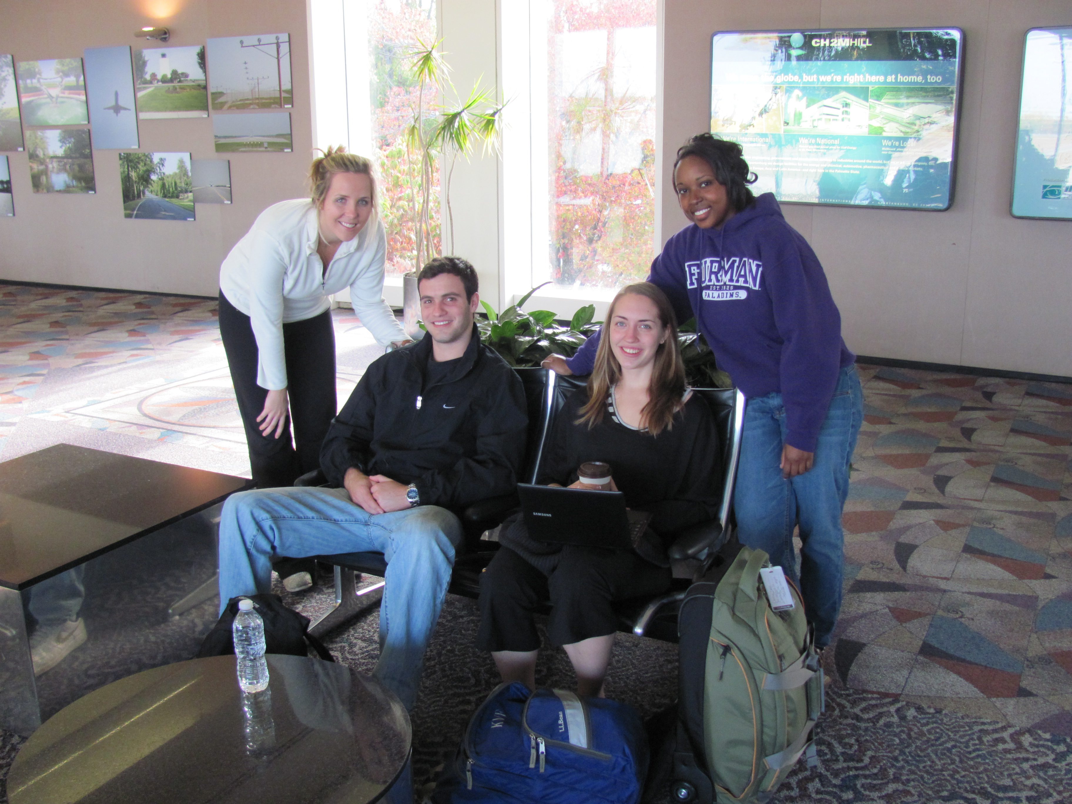 Students - Jane Sanders, Chris Picardi, Katie Fearington and Alyssa Richardson - waiting to depart for Hawaii