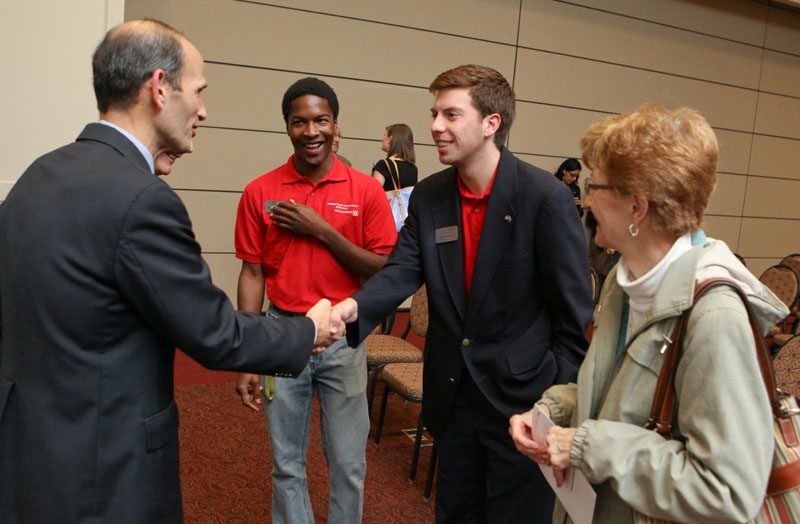 Ben Saul and Kenny Palmer speaking with Governor John Baldacci