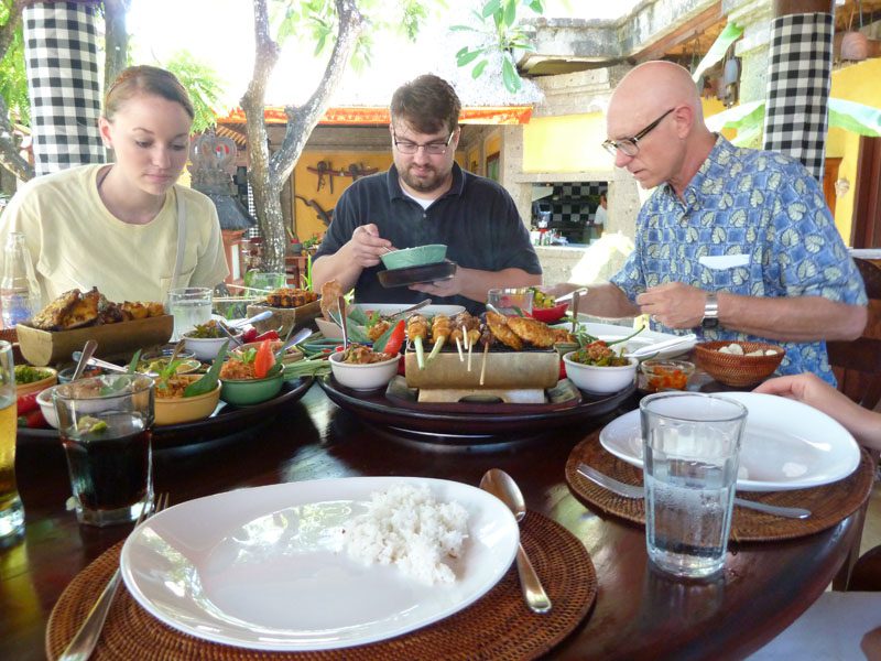 Katie, Dr. Cook, and Dr. Fraser enjoying a delicious meal at Bumbu Bali