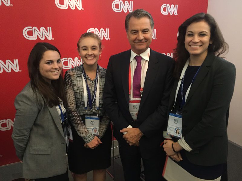 Students Kelsey Orr, Gray Johnson, and Mallary Taylor are pictured with Andrew Stevens, CNNMoney's Asia-Pacific Editor, who served as a moderator during the APEC CEO Summit.