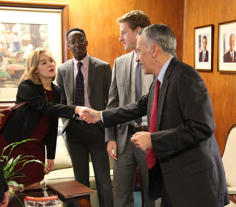 U.S. delegate Gray Johnson greets Ambassador Goldberg upon arrival