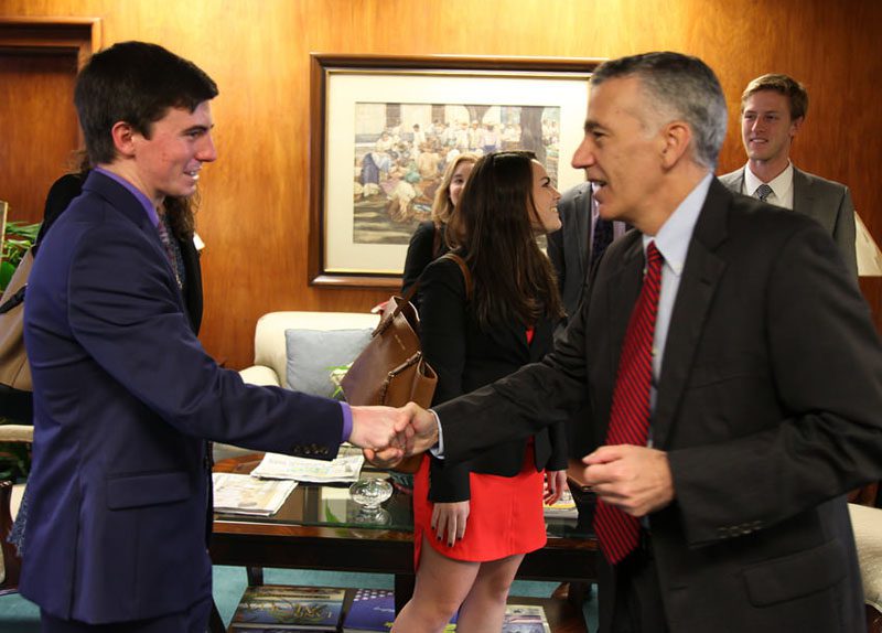 U.S. delegate Matthew Deininger meets Ambassador Goldberg upon arrival at the embassy