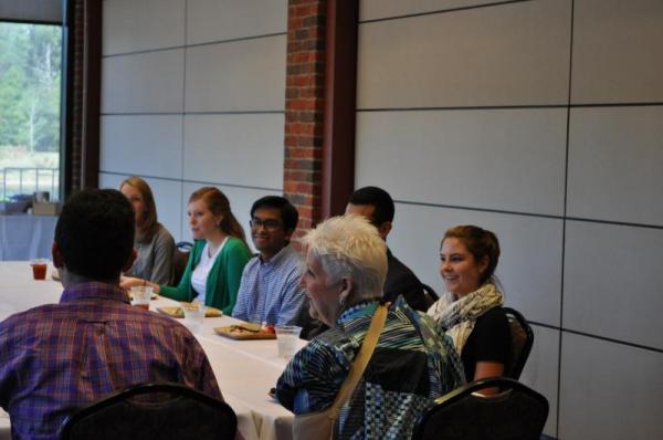 Deborah Malac, U.S. Ambassador to Uganda, meeting with many of the Riley Institute Advance Team members over lunch