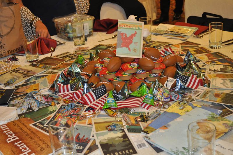 Decorating the Furman table at the APEC Voices of the Future 2016 closing ceremony and Cultural Night at Restaurant Mandarin