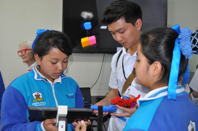 The students from the Escuela de Talentos demonstrating technology they have learned at the school