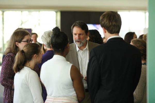 Mike Roosevelt speaking with students