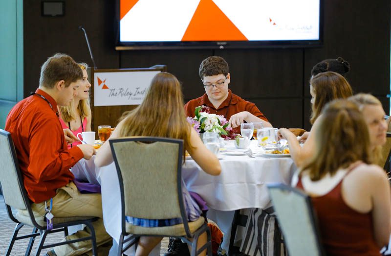 Michael Bowling and other freshman scholars enjoy the Welcome Dinner at the start of the Advantage Scholars program