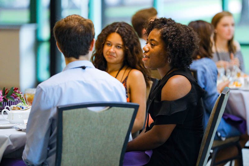 Maya Dunn and Shekinah Lightner enjoy the Welcome Dinner at the start of the Advantage Scholars program