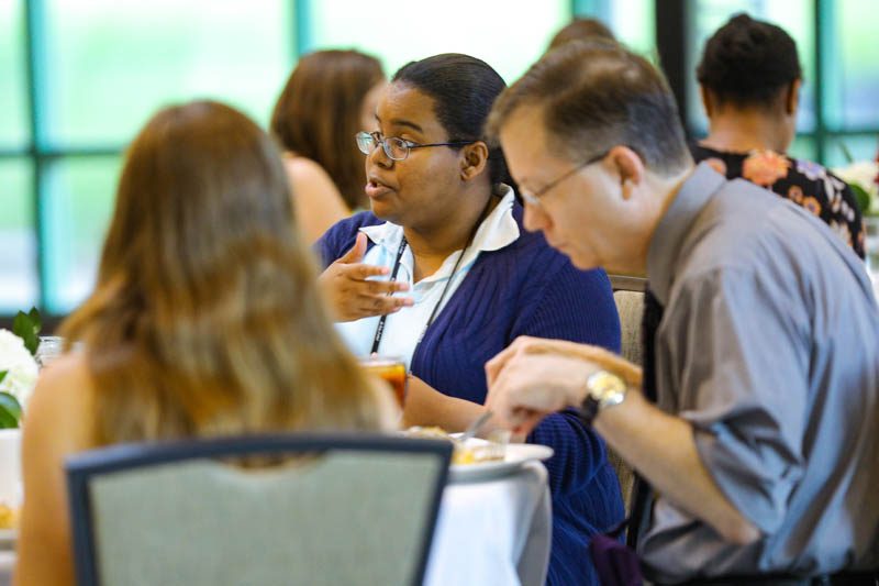 Shaelyn Rivers-Green and Dr. Henderson enjoy the Welcome Dinner at the start of the Advantage Scholars program