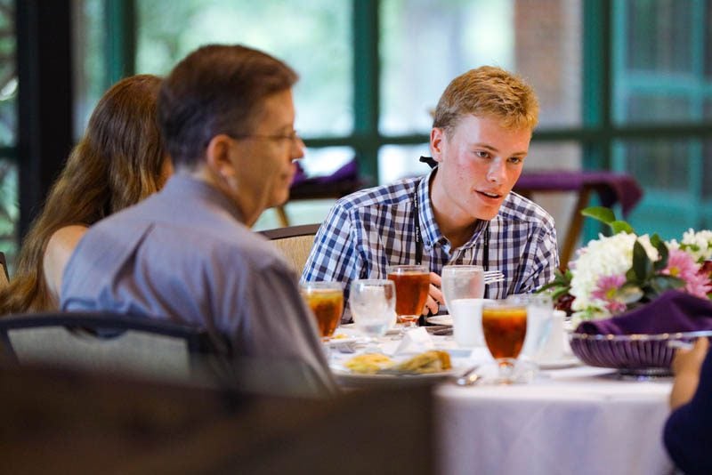 Price St. Clair enjoys the Welcome Dinner at the start of the Advantage Scholars program
