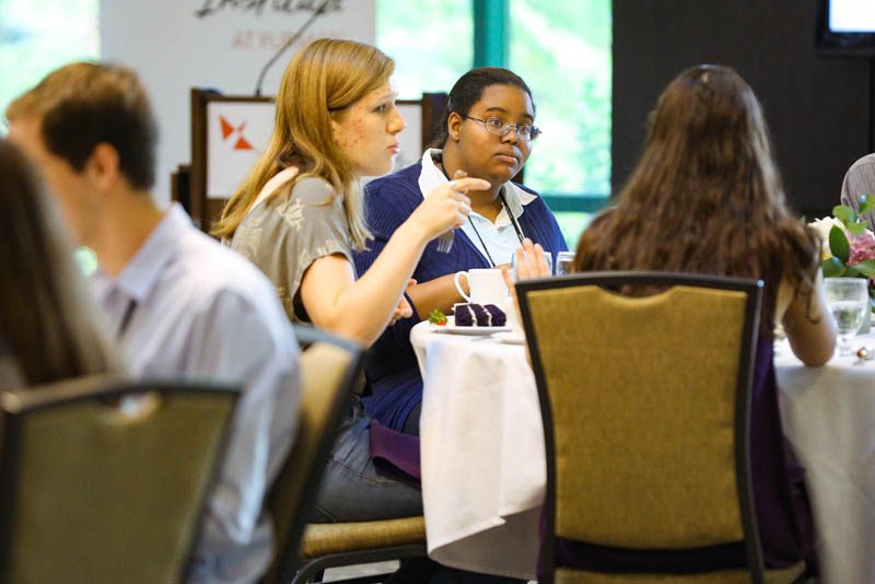 Lindsey Cottle and Shaleyn Rivers-Green enjoy the Welcome Dinner at the start of the Advantage Scholars program