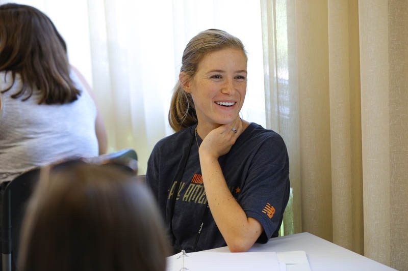Maggie Welsh chats with other scholars during the lunch at the Shi Center for Sustainability