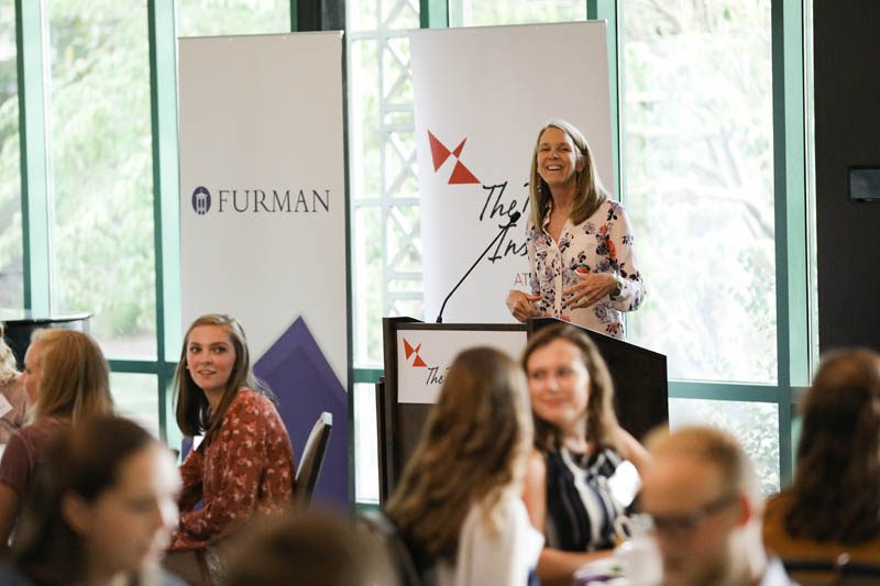 Jill Fuson, Director of Center for Critical Issues, welcoming the scholars