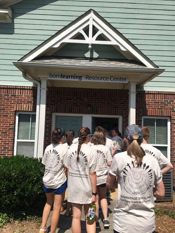 The scholars participate in a walking tour of Nicholtown