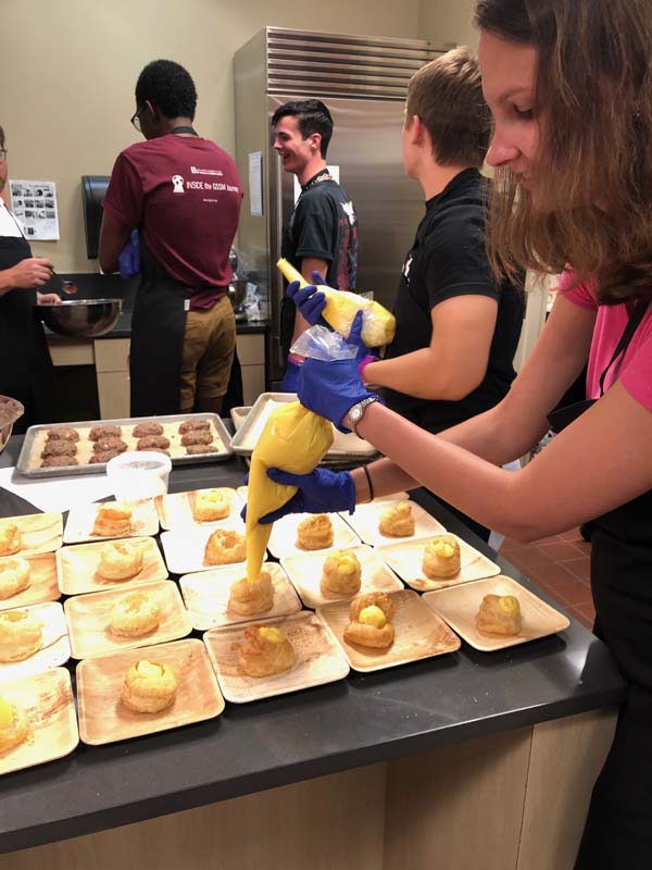 Lauren Garrison preparing the dessert