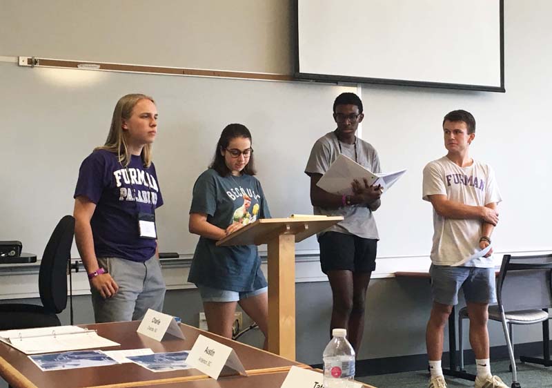 Presentation of Youth Declaration. (l-r) CJ Waldrop, Tate Rosen, Austin Geers and Charlie Reiney
